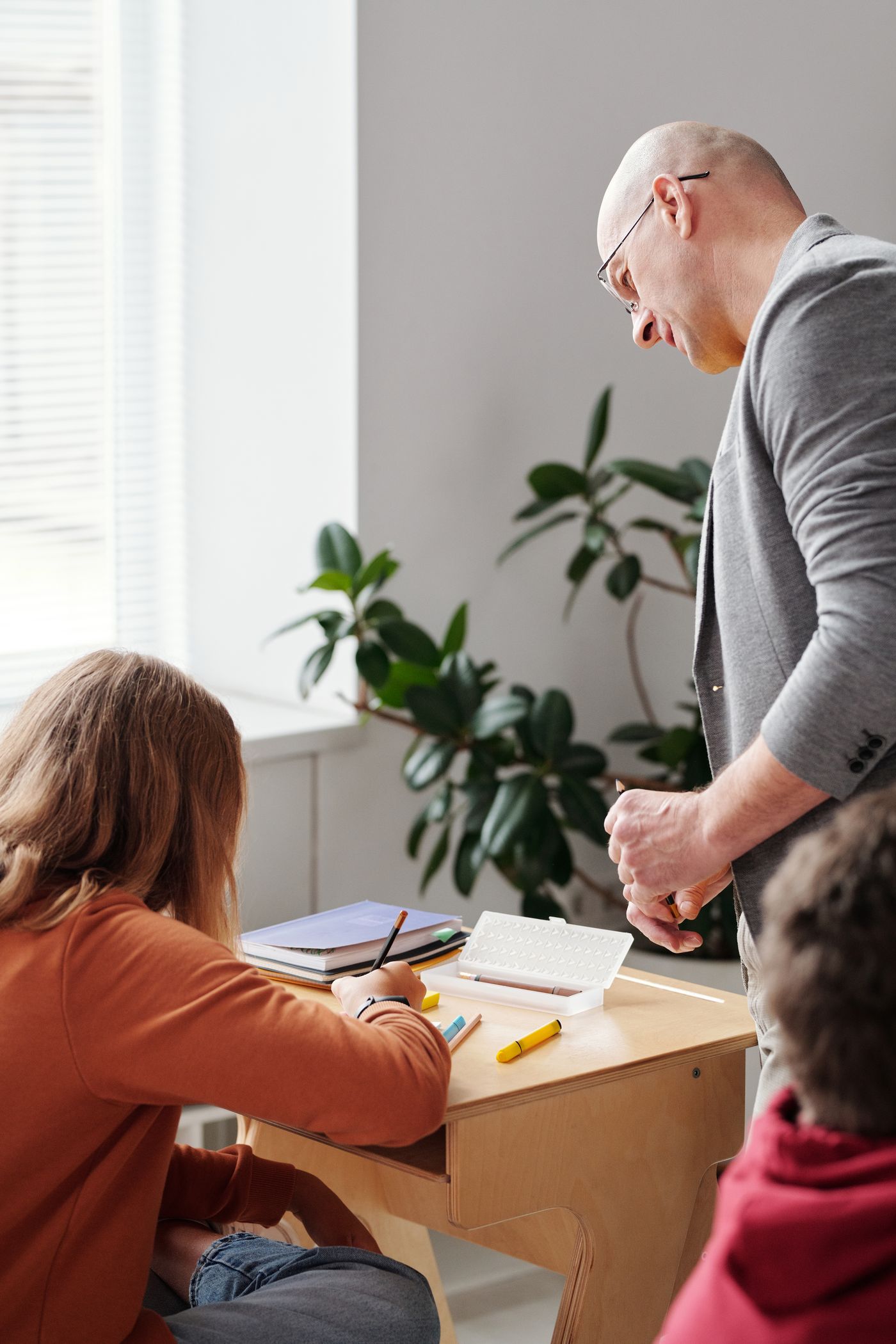 A teacher reviewing a student’s writing